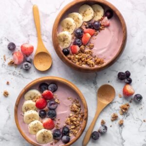 brown wooden spoon on white ceramic bowl