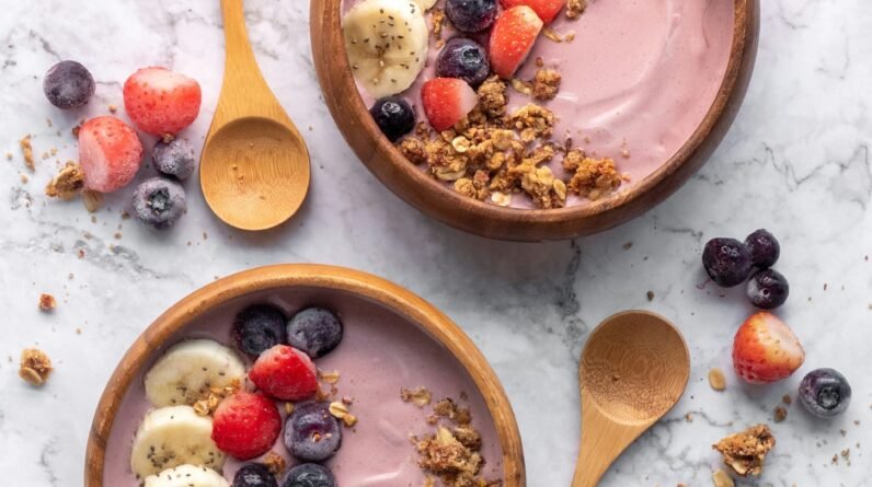 brown wooden spoon on white ceramic bowl